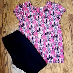 Pink, multi color blouse with flutter sleeves.